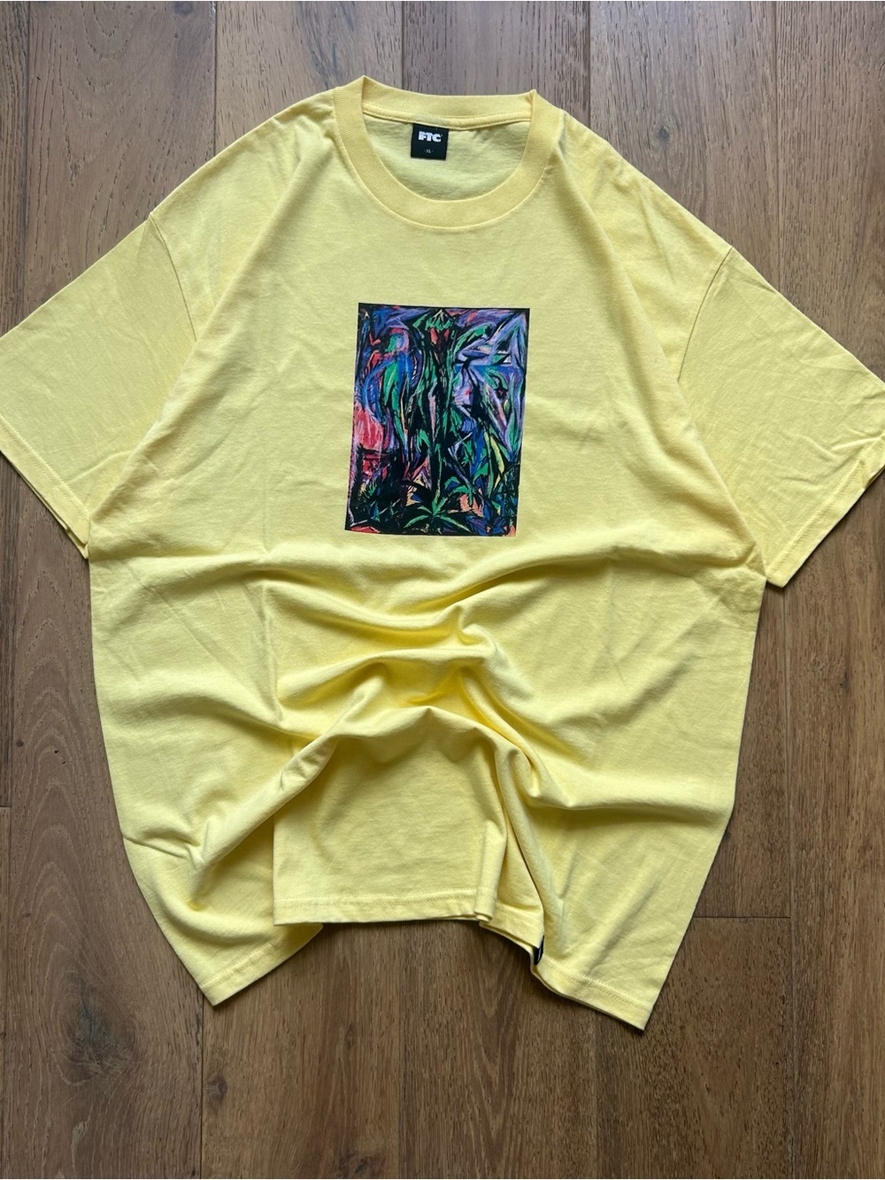 FTC Yellow Graphic Tee with Colorful Abstract Print
